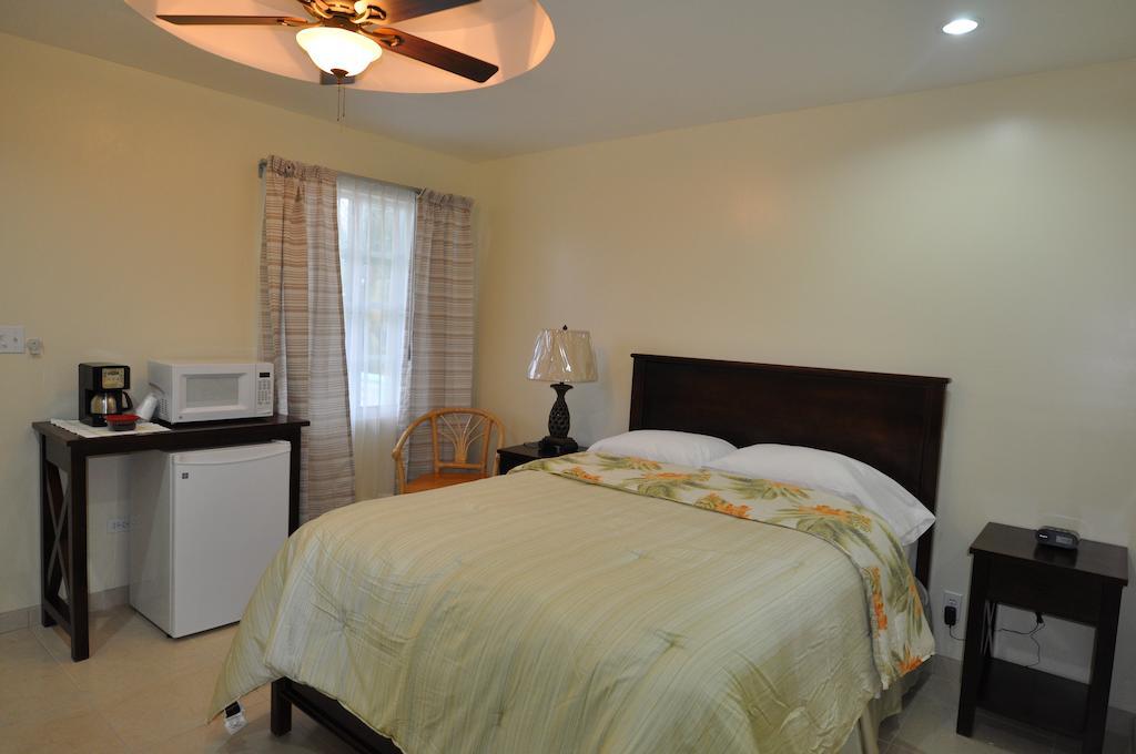 Rainbow Hotel Caye Caulker Rom bilde