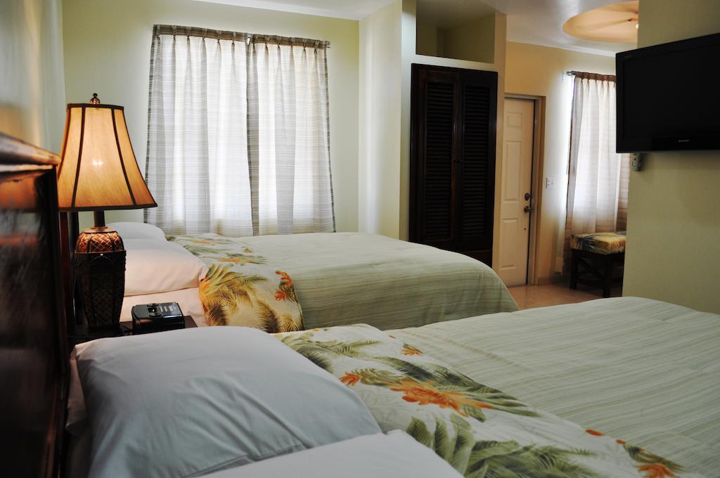 Rainbow Hotel Caye Caulker Rom bilde