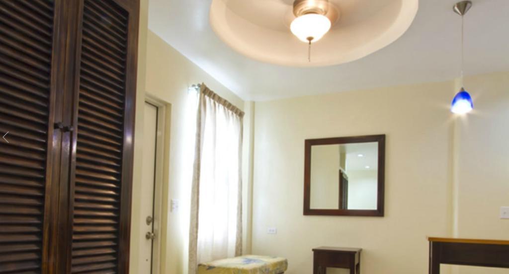 Rainbow Hotel Caye Caulker Rom bilde