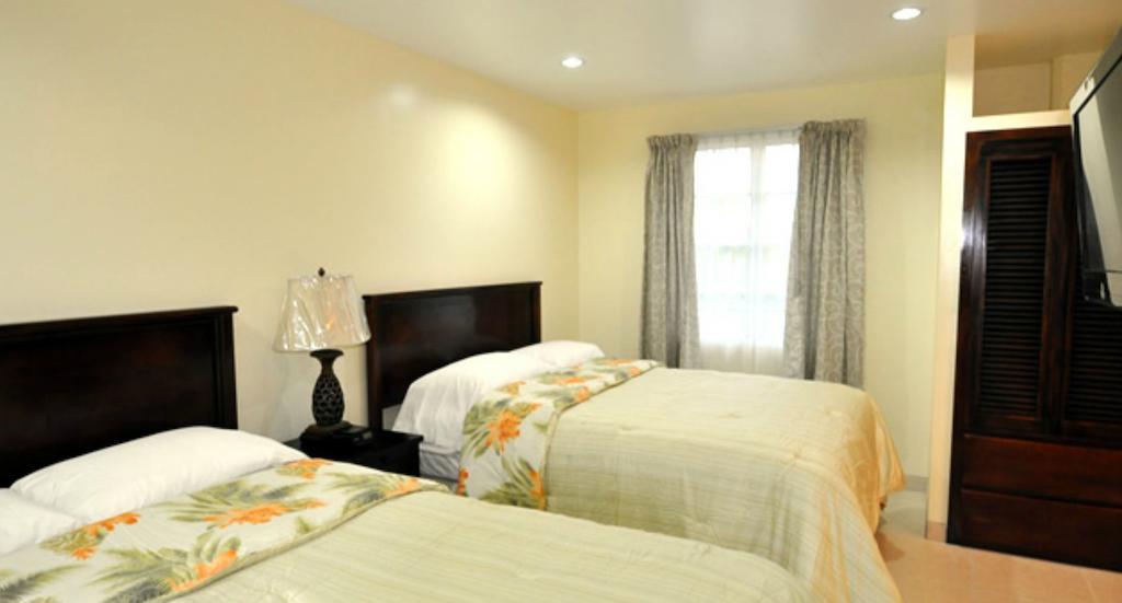 Rainbow Hotel Caye Caulker Rom bilde